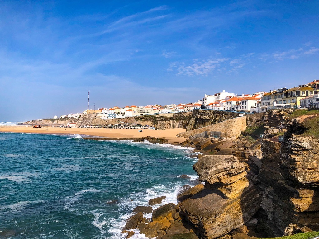 A panoramic view of Praia dos Pescadores and the down on the cliffs above