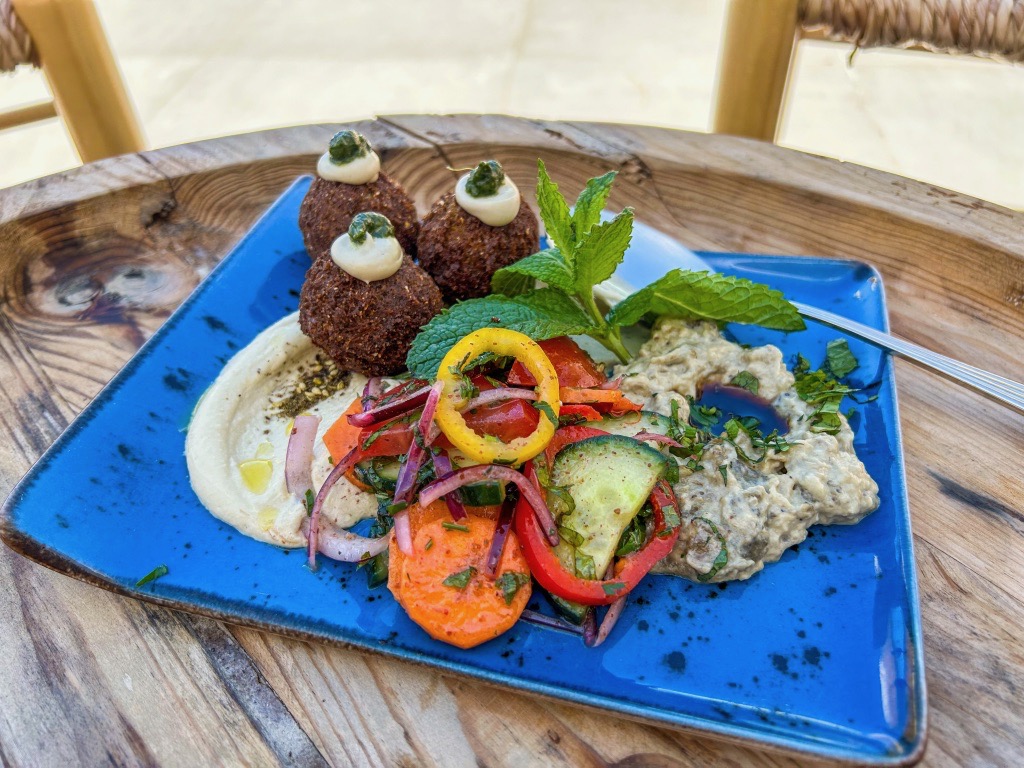 Balagan Mezze Plate The Balagan Mezze plate for one person has hummus, falafel, and fresh vegetables