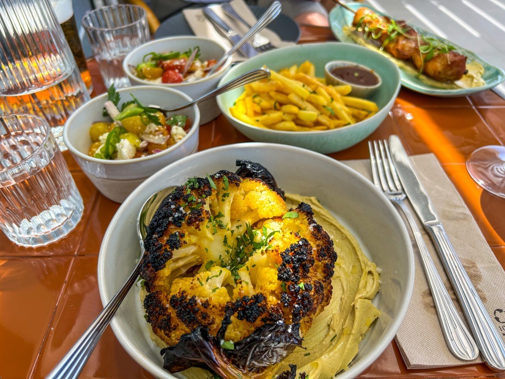The smoked Cauliflower from Balagan Ericeira, along with tomato salad and french fries