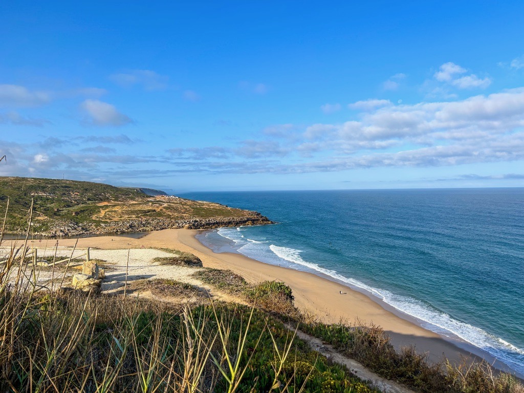 Foz do Lizandro beach at sunrise, a view from the hiking trails above